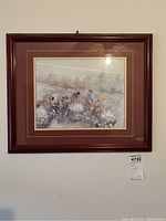 Full view of framed artwork with brown mat frame showing the scene of people picking cotton.