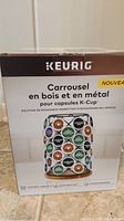 Photo of the boxed Keurig K-Cup holder carousel showing front design and storage capacity
