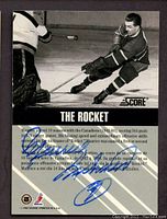 Back side of 1992-93 Score The Rocket hockey card showing career stats and biography of Maurice Richard with autograph in blue Sharpie.