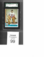 Front side of 1974-75 O.P.C. Billy Smith hockey card in SGC graded slab showing player image and grading label.