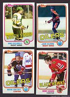 Four cards: Dino Ciccarelli (North Stars), Jari Kurri (Oilers), Wayne Gretzky (Oilers), Denis Savard (Black Hawks)