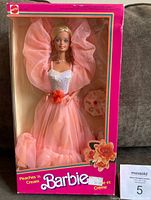Front view of sealed Peaches 'n Cream Barbie in original box showing doll in peach gown and tulle shawl