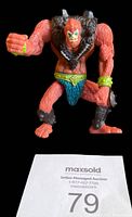 Close-up image of the orange-furred He-Man Beast figure with green wristband, turquoise loincloth, and brown boots and fur collar.