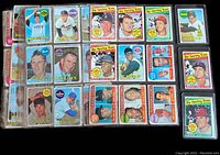 Image showing a variety of 1969 Topps baseball cards laid out in rows with notable players and All Star cards visible.