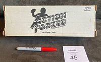 Sealed 1990 Action Packed football card box with 280 player cards and box front logo.
