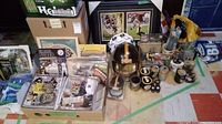 Overview of all Pittsburgh Steelers memorabilia items arranged on floor