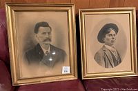 Two large framed Victorian portraits of gentlemen from early 1900s, one behind glass, wood frames about 20x24 inches.