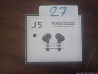 Box of J5 Original Quality wireless earphones with image and text.