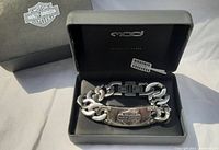 Harley-Davidson branded black box with the stainless steel link bracelet inside showing the Harley-Davidson logo plate on the front.
