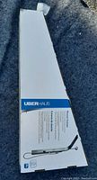 Box of Uberhaus shower column showing product name, brand, and product image.