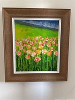 Full view of framed original flower painting showing bright greens, pinks, and blues in the composition.