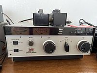 Front view of Ten-Tec Centurion amplifier with two auxiliary modules on top