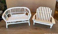 Pair of doll-sized white benches: wicker and wood styles shown side by side on wooden floor