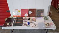 Full table layout showing all scrapbooking materials including tool and scrapbooks.