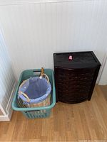 Photo of three hampers including the wooden hamper, plastic laundry bin, and wicker basket showing overall size and detail.