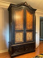 Full front view of armoire showing two doors and two drawers