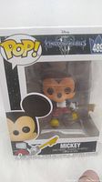 Front view of the Funko Pop box showing Mickey Mouse figure and Kingdom Hearts branding with number 489