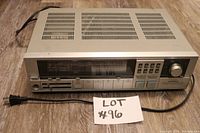 Front view of Pioneer computer controlled stereo receiver showing large digital frequency display, source selection buttons and volume knob.