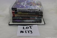 Stack of five PS3 games showing front cover and spines for identification