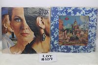 Photo showing the front album covers of Styx and The Rolling Stones vinyl LPs side by side.