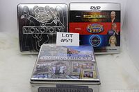 Three DVD trivia game tins displayed: Monopoly, Deal or No Deal/Family Feud/Who Wants To Be A Millionaire, and Coronation Street (sealed)