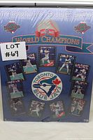 Frontal photo of sealed Toronto Blue Jays 1993 World Champions Plak-It Style memorabilia board with some packaging damage.