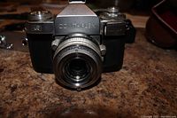 Front view of the Zeiss Ikon Contaflex IV camera showing the mounted Carl Zeiss Tessar 50mm f/2.8 lens.