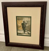 Framed 1853 George Baxter print showing chimney sweep, with dark carved wooden frame and cream and green matting.