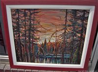 Full front view of framed oil painting showing forest landscape scene