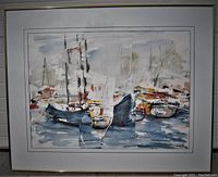 Full frontal view of the framed watercolour yacht harbour collage painting showing the entire artwork within the white mat and slim gold frame.