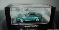 Porsche 911 Turbo green diecast car in original Minichamps box, front view