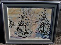 Frontal view of framed impressionist oil painting showing snow-covered pine trees and textured brush strokes.