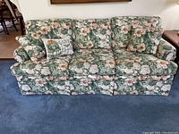 Front view of Ethan Allen floral upholstered sofa showing overall condition and fabric pattern.