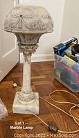 Full view of lamp showing overall design, column, base and shade