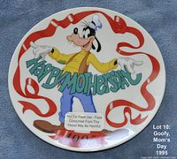 Front view of the 1995 Goofy Mother's Day plate by Grolier showing colorful Goofy illustration, Happy Mother's Day text, and red ribbon border.