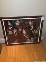 Framed print showing full artwork featuring abstract musicians in a wooden frame with white mat.