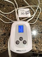 Digital controller display showing temperature setting '4' and control buttons