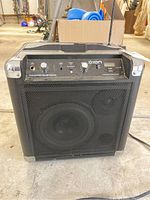 Front view of ION Tailgater Bluetooth portable amp/radio showing control panel and speaker grille.