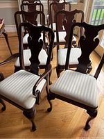 Group of eight chairs, showing front view of lot