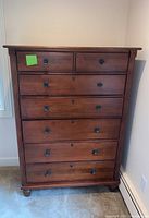 Front view showing two small top drawers and four full-width drawers