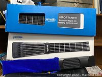 Photo showing boxed Jamstik+ Smart Guitar and additional small Jamstik in a blue velvet pouch