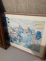 Framed poster 'Autumn Wash' by Linda Adams Kessler in pastel blue and beige landscape style.