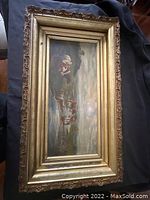 Framed oil painting of cows in landscape with ornate gold frame.