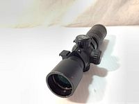 Front angled view of Excalibur Tact Zone crossbow scope showing lens and turret details