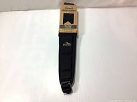 Photo of the Butler Creek Comfort Stretch Sling in its original packaging showing the sling laid out and label visible.