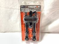 Front view of new Champion Pivot Bipod in original packaging showing leg adjustment and pivot lever.