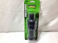 Front view of new Primos Gobbler Shaker turkey call still in original green and clear packaging with visible brand and product name.