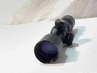 Side view of the black Octane Dead Zone crossbow scope showing lens and adjustment turrets.