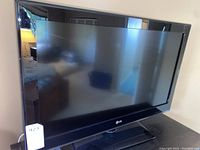 Front view of LG 32 inch HDTV showing screen and black bezel with LG logo