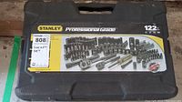 Black carrying case with handle, Stanley Professional Grade label showing 122 pieces socket set.